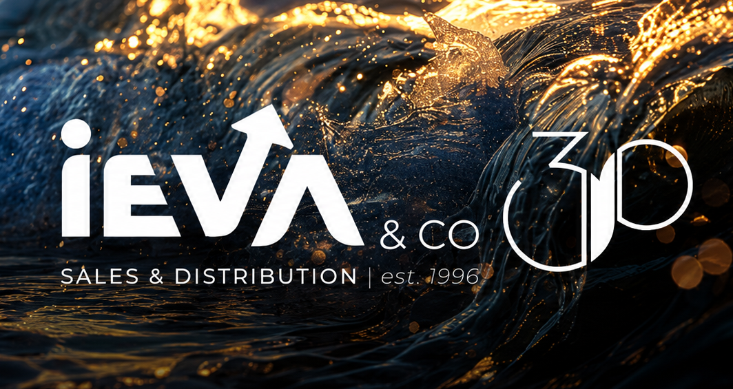 IEVA & Co. 30th anniversary graphic with the sales and distribution logo against an abstract dark background.